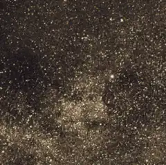 Bitcoin coin on glitter background
