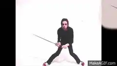 Johnny Rotten playing sword with Japanese woman