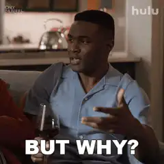 Man holding wine glass asking but why