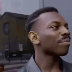 Man tapping his head thinking