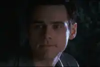 Jim Carrey smirking and smiling