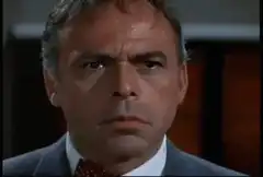 Man sweating and winking