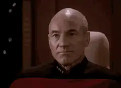 Picard smiling and saying nicely done