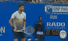 Novak Djokovic shirt rips during match