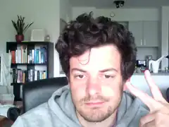 man making peace sign