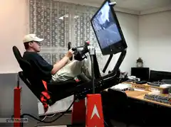 Man in homemade motion simulator