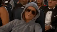 Rachel Green nodding in sunglasses