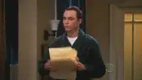 Sheldon throws papers in the air