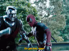 Colossus charges at Deadpool