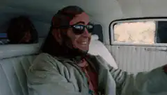 The Creeper driving his car