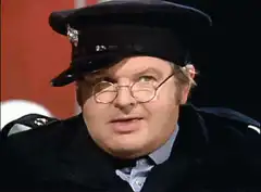 Inspector Clouseau Smirking