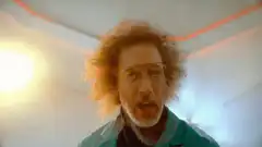 The Dude adjusting his glasses