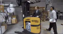 Forklift crashes into warehouse shelves