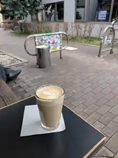 Latte art on outdoor table