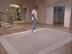 Will Smith standing on a rug