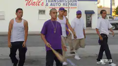 group of men walking with baseball bat