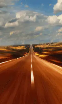 Long straight road through desert