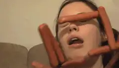 woman with sausages on face