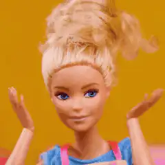 Barbara doll shrugs then covers mouth