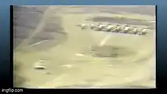 Aerial view of a large circular explosion
