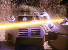 Space Patrol vehicle firing lasers