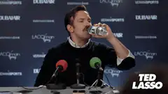 Ted Lasso spits water on himself