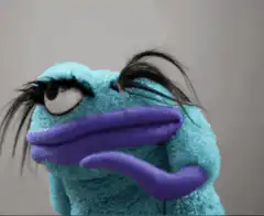 Blue Muppet with purple lips