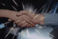 Handshake with sparkling light effects