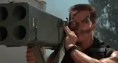 Arnold Schwarzenegger fires rocket launcher