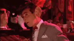 Man in mask reacts with shock