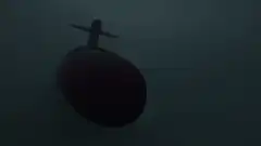 Submarine sinking into dark water