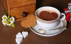 heart-shaped cocoa and cookies