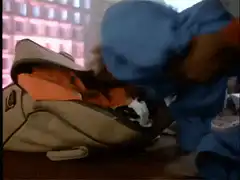 Man stomps on suitcase to close it