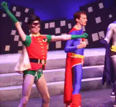 Robin punches Superman