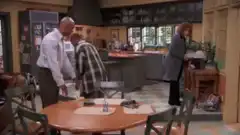 Jerry, George, and Elaine in the kitchen