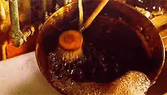 Pouring liquid into a bowl with a brush