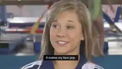 Gymnast holds taco and says it makes her taco pop