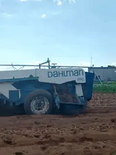 Dahlman Inc. planter stuck in mud