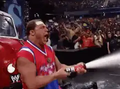 John Cena spraying champagne