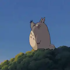 Totoro waving at a bird