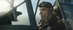 Pilot in cockpit looking surprised