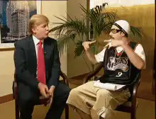 Donald Trump and Snoop Dogg finger guns