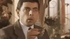 Mr. Bean eating an oyster