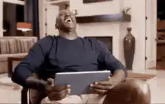 Michael Jordan laughing at tablet