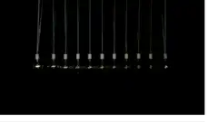 Newton's cradle with light bulbs