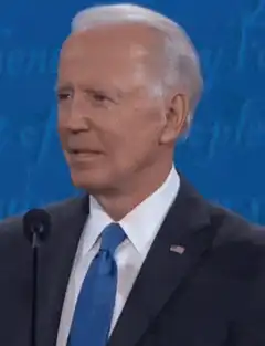 Joe Biden blinking and smiling