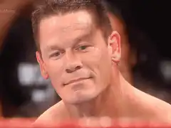John Cena smirking and looking down