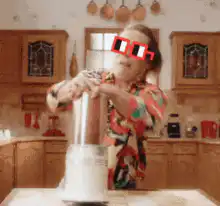 Woman shaking blender with sunglasses