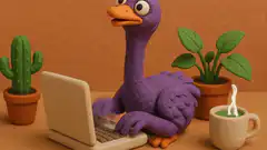 purple bird typing on laptop
