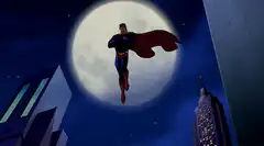 Superman flying in front of the moon